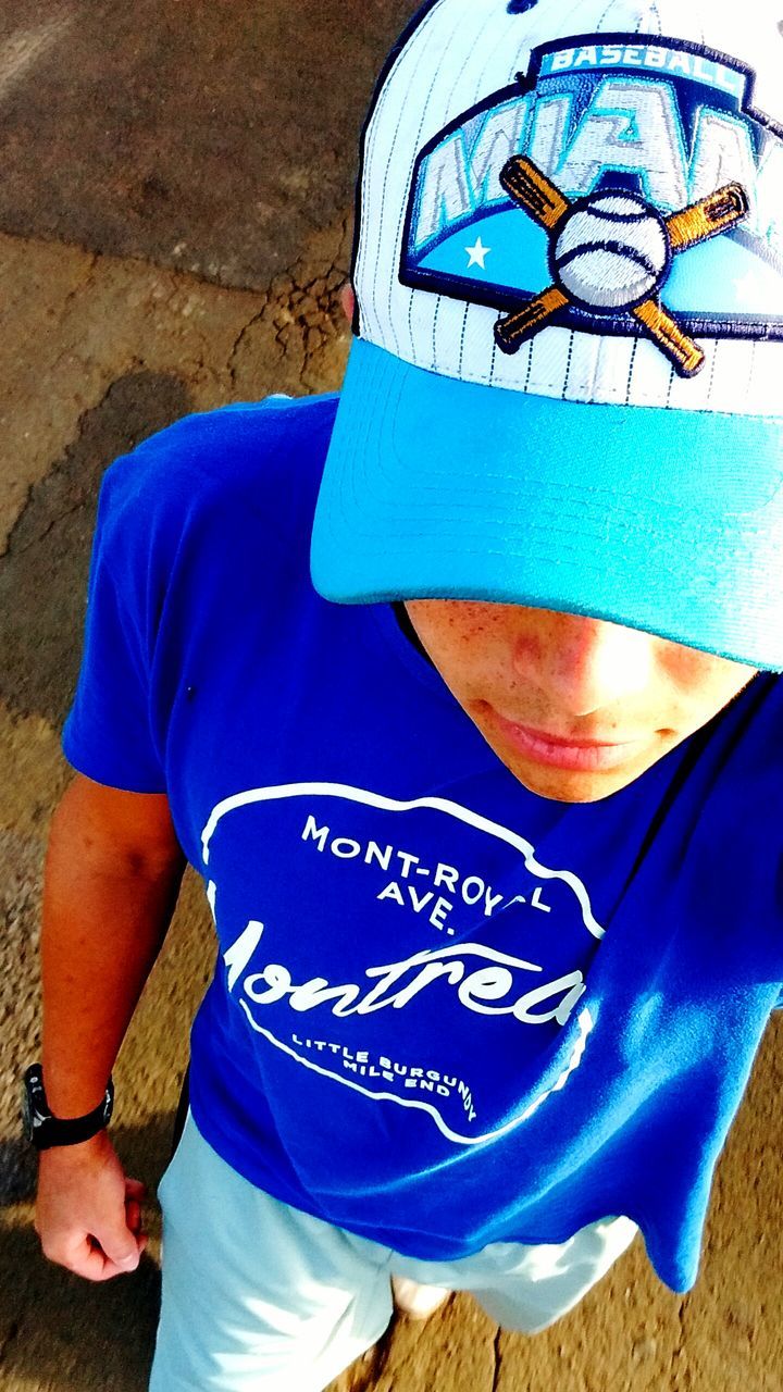 CLOSE-UP PORTRAIT OF BOY WEARING BLUE HAT