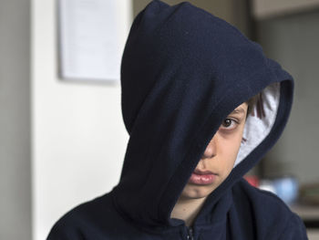 Portrait of teenage girl wearing hat