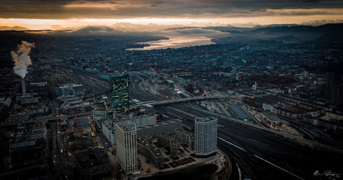 High angle view of city against sky during sunset