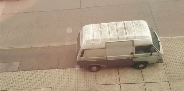 High angle view of truck on road against wall