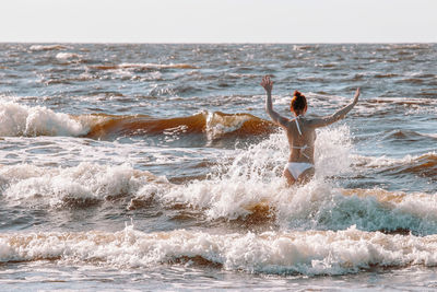 Man surfing in sea