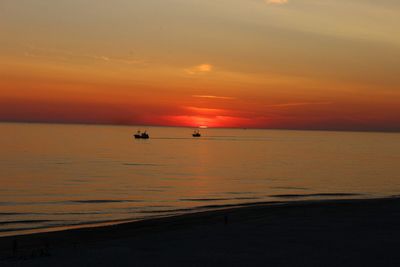 Scenic view of sea at sunset