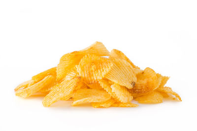 Close-up of fresh yellow pepper against white background