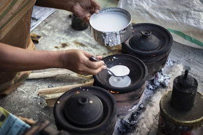 High angle view of man preparing food