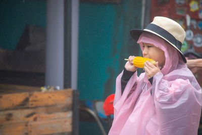 Midsection of woman eating food