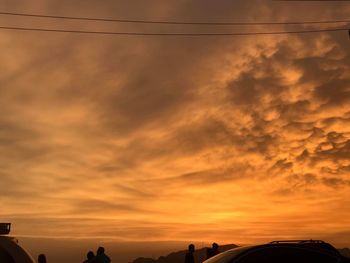 Low angle view of dramatic sky during sunset