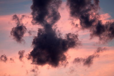 Low angle view of dramatic sky during sunset