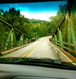 Road passing through car windshield