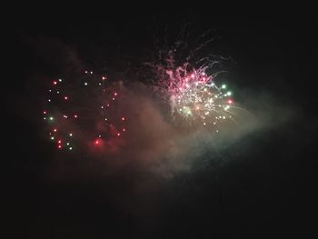 Firework display at night