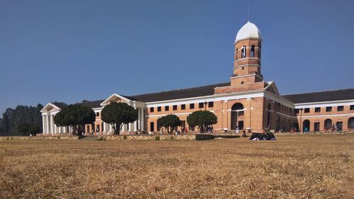 View of temple against clear blue sky