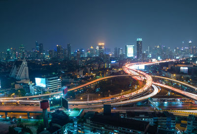 Illuminated cityscape at night