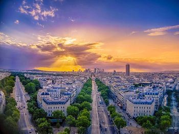 High angle view of city buildings during sunset