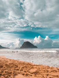 Scenic view of beach against sky
