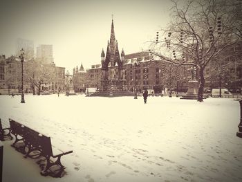 View of buildings in city during winter