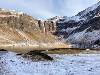 Scenic view of snowcapped mountains against sky, lago cadagno 