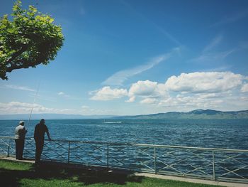 Scenic view of sea against blue sky