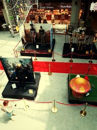 High angle view of illuminated lanterns hanging in store