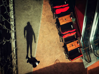 High angle view of people walking on sidewalk in city
