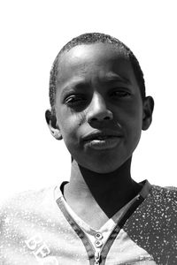 Portrait of smiling man against white background