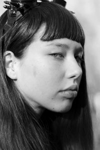 Close-up portrait of young woman