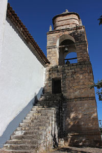 Low angle view of old building against sky