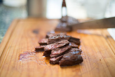 Close-up of meat on cutting board