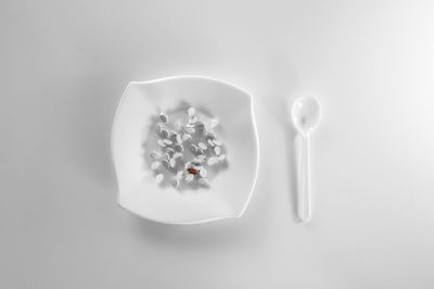 High angle view of ice cream on white table