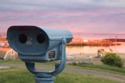 Coin operated binoculars against sea and sky