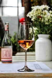 Close-up of wine glass on table