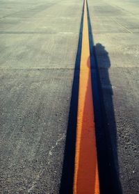 High angle view of shadow on road