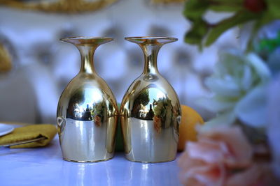 Close-up of glasses on table