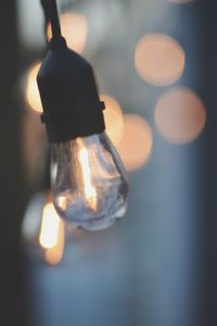 Close-up of illuminated light bulb