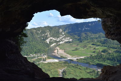 Scenic view of landscape and mountains against sky