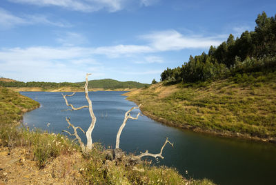 Scenic view of land against sky