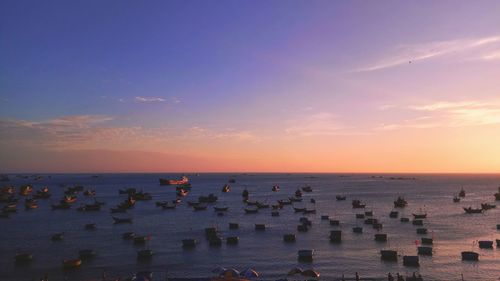 Scenic view of sea against sky at sunset