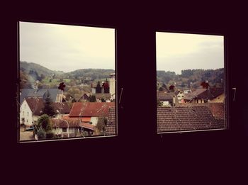 View of cityscape through window