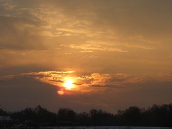 Scenic view of dramatic sky during sunset