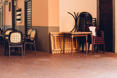 Empty chairs and table at restaurant