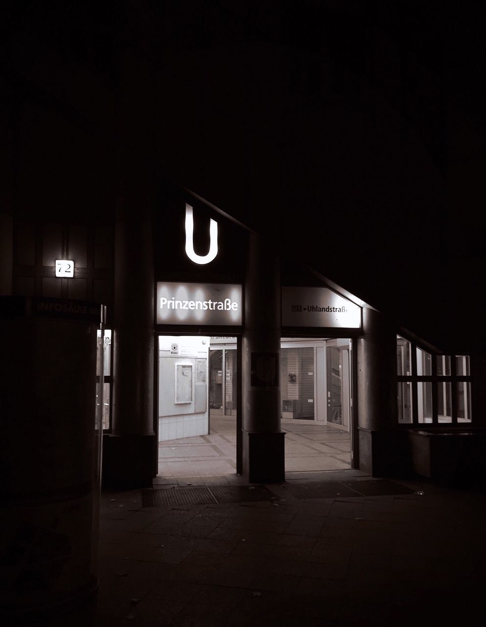 architecture, built structure, illuminated, indoors, empty, night, entrance, building exterior, corridor, dark, door, window, building, absence, architectural column, interior, flooring, the way forward, no people, column