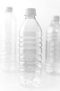 Close-up of water bottle in glass