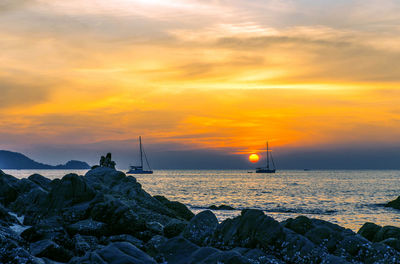 Scenic view of sea against sky during sunset