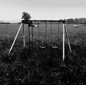 Wind turbines on grassy field