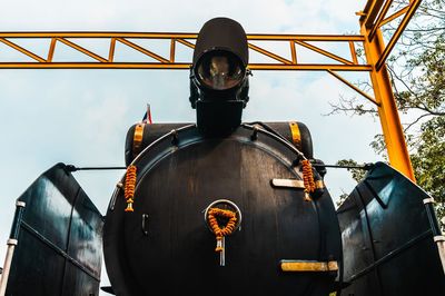 Low angle view of train against sky