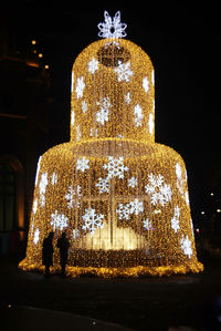 Close-up of illuminated christmas tree at night