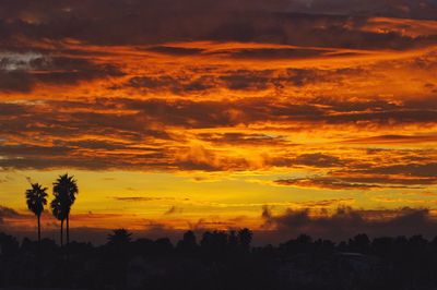 Scenic view of dramatic sky during sunset