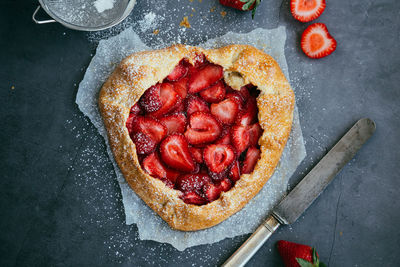 Directly above shot of strawberry tart on table