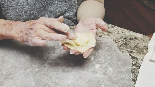 High angle view of man preparing food