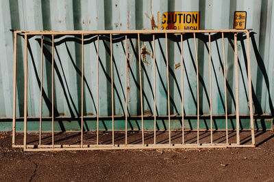 High angle view of metal railing on wall