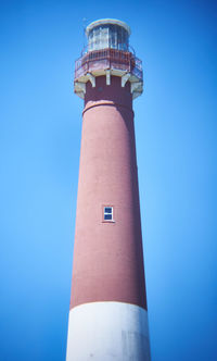 Low angle view of lighthouse against clear sky