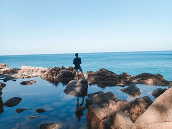 Scenic view of sea against clear sky